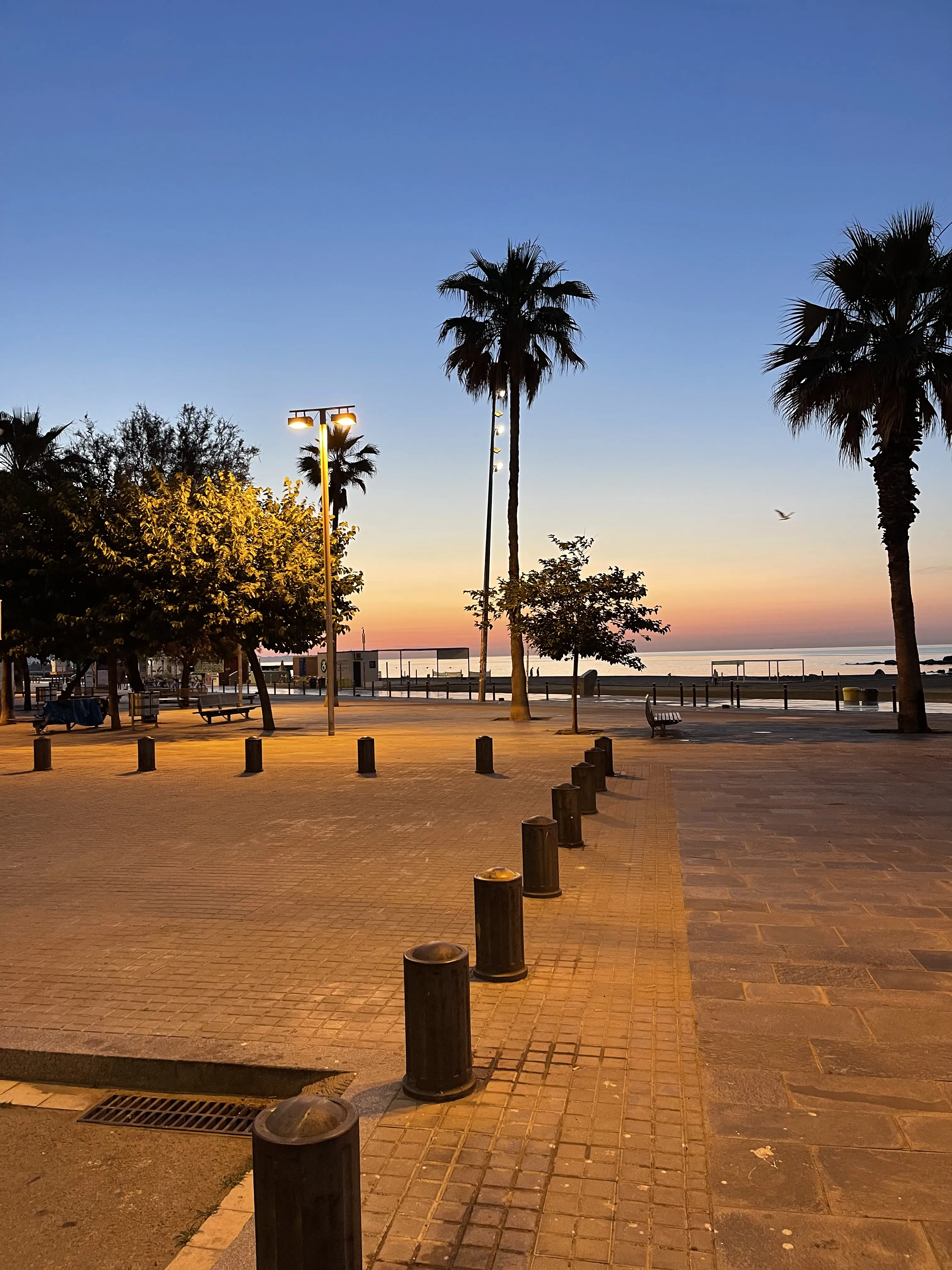 Sunrise over Barceloneta beach and the sea, Barcelona