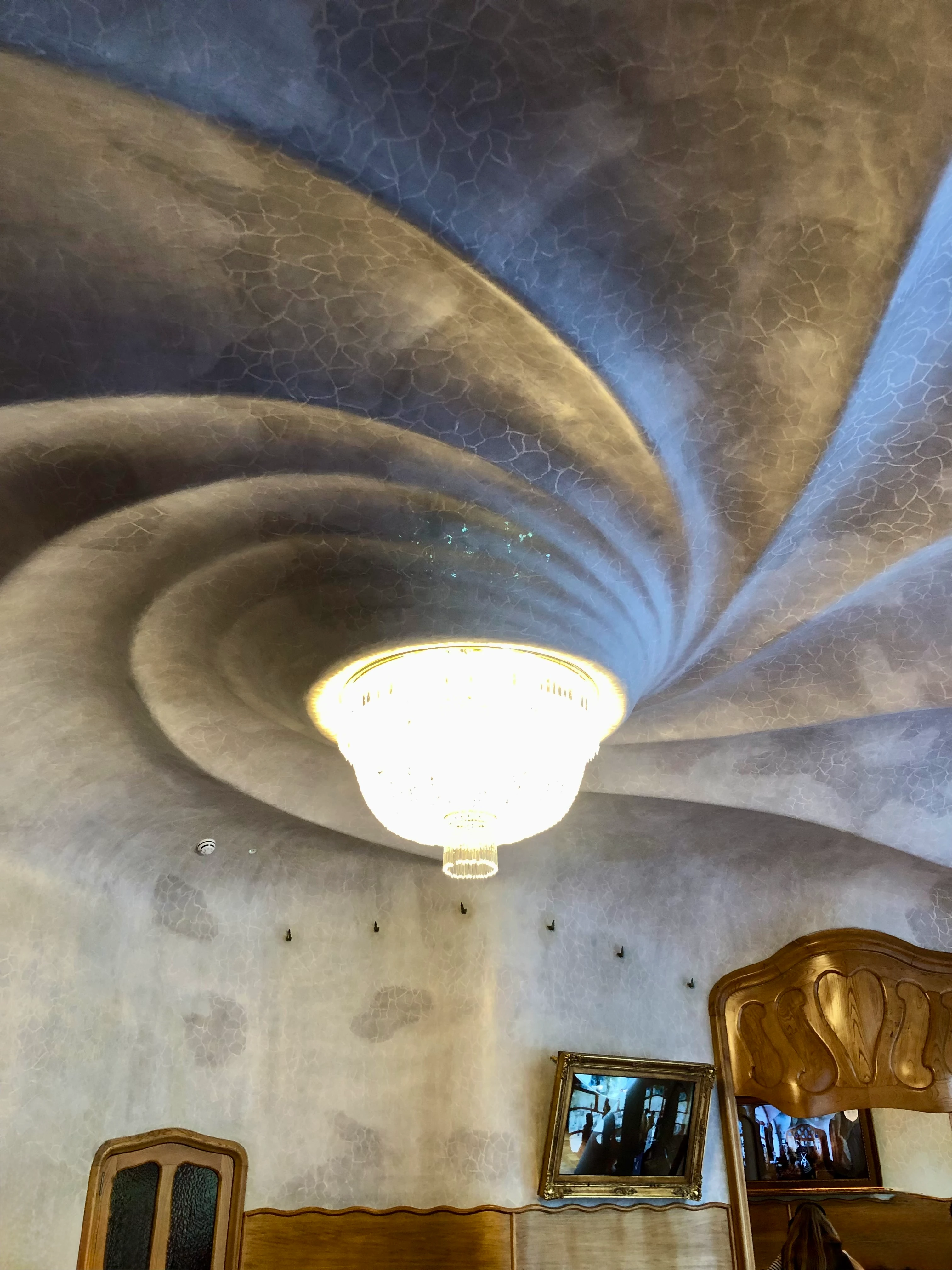 Spiral whirlpool ceiling in the main room of Casa Batlló Barcelona
