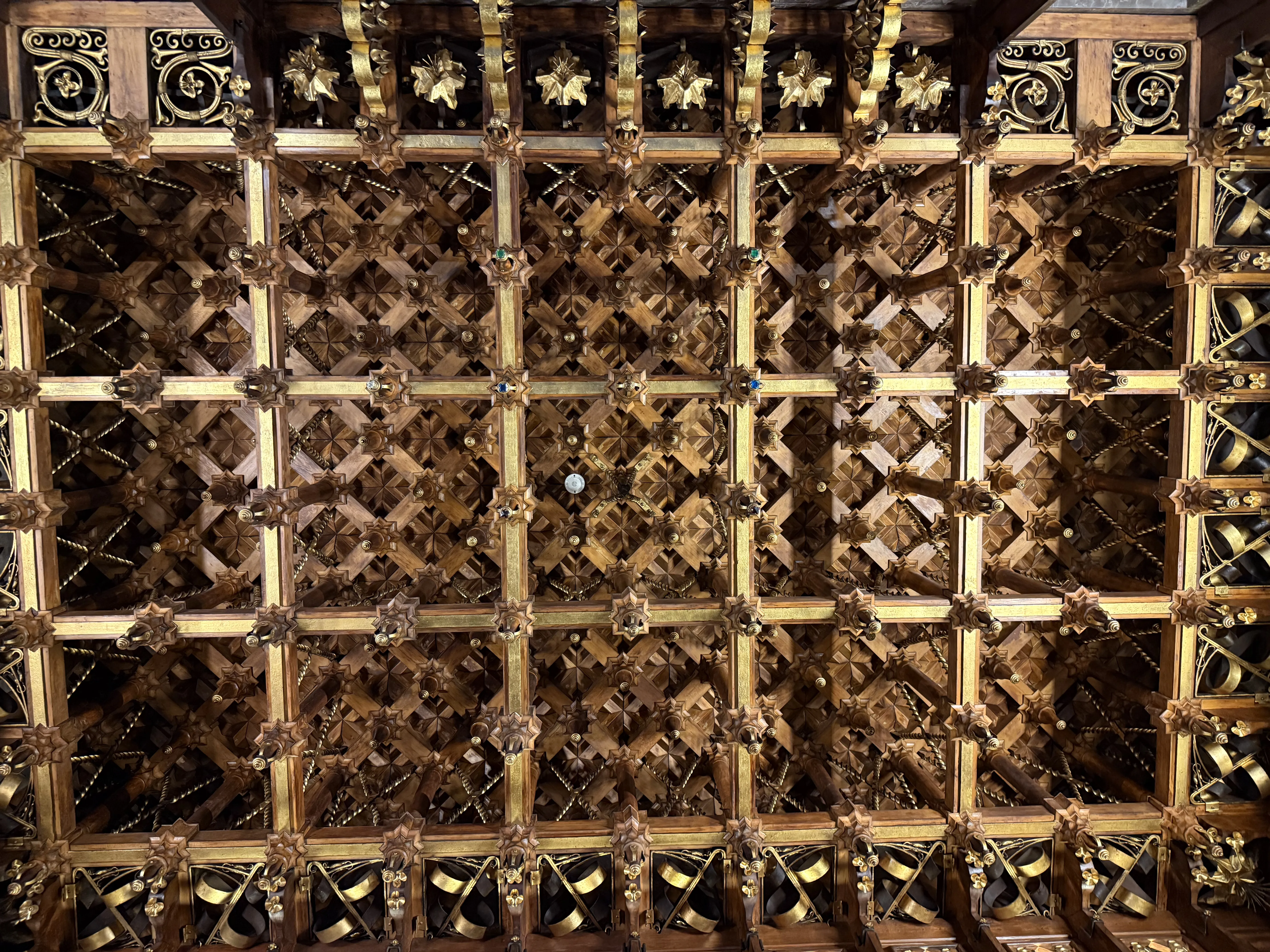 Detail of Gaudí's hand-carved wooden ceiling at Palau Güell, Barcelona